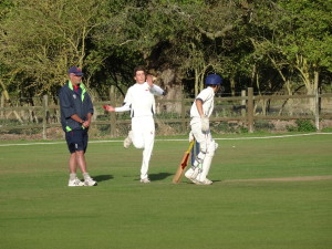 Action: Sam Carding (bowler), Joey Greenslade (batsman) & Chris Brook (umpire)