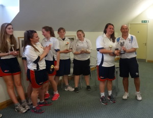 Kevin Denmark presents the Cup to Captain Emily Reay.